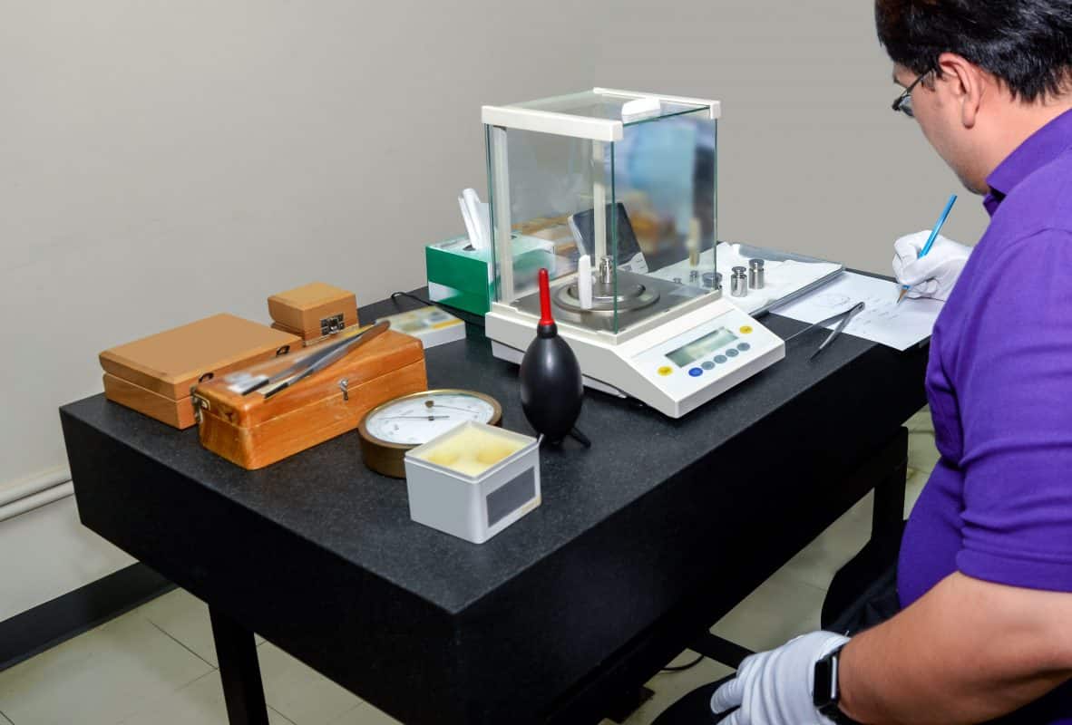 Bio Matrix technician servicing a laboratory balance
